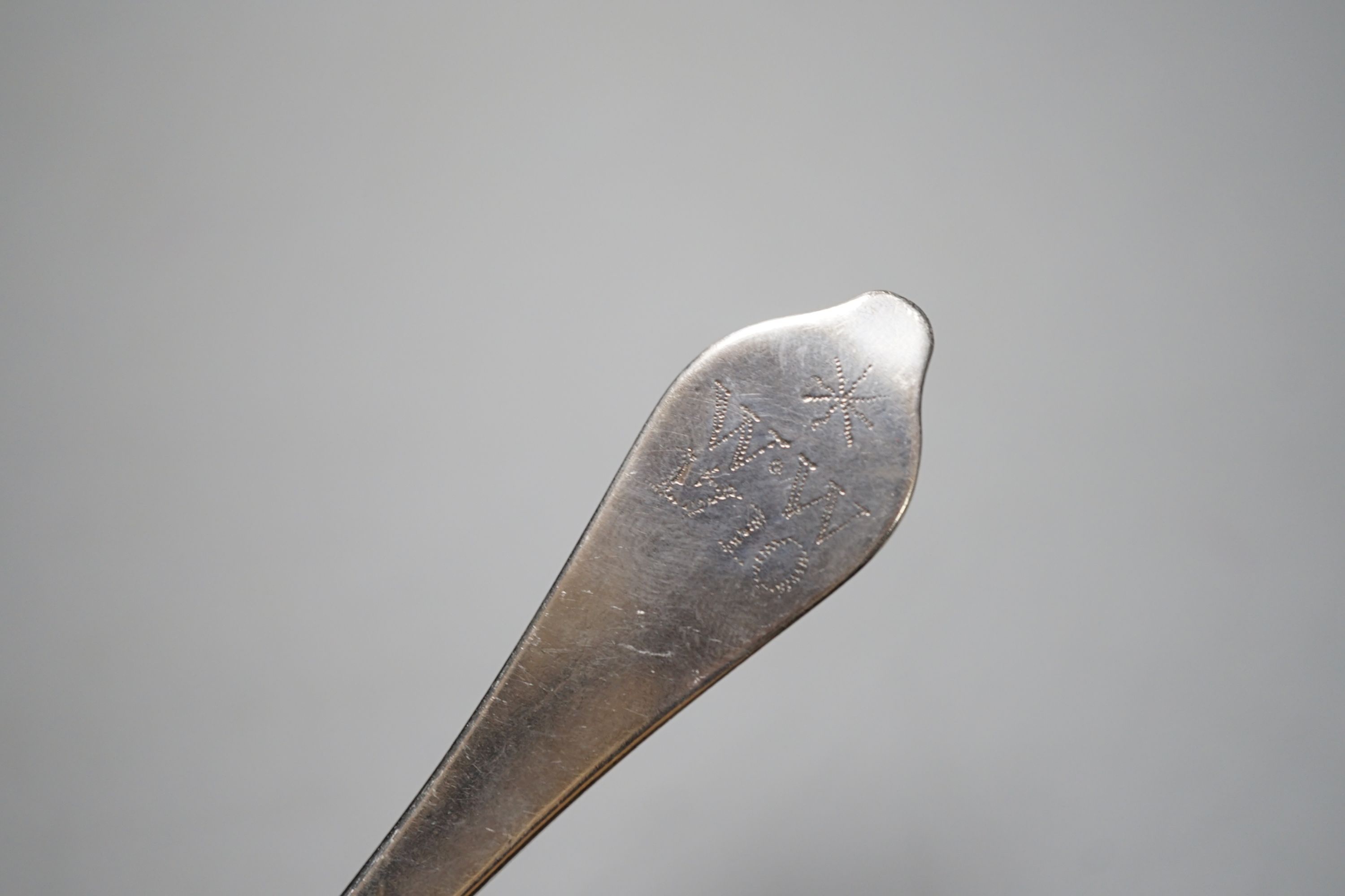 An early 18th century silver dog nose spoon, with prick dot engraved initial and date, marks rubbed, 19cm, 46 grams.